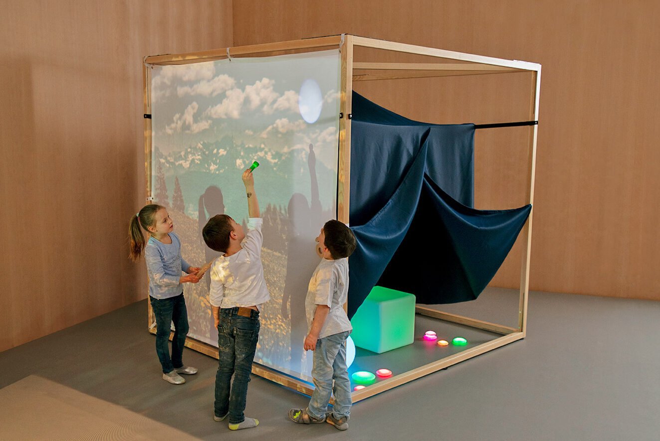 Room Cube with a modular design, featuring solid ash wood, flexible accessories, and a multi-purpose space for children's creative play.
