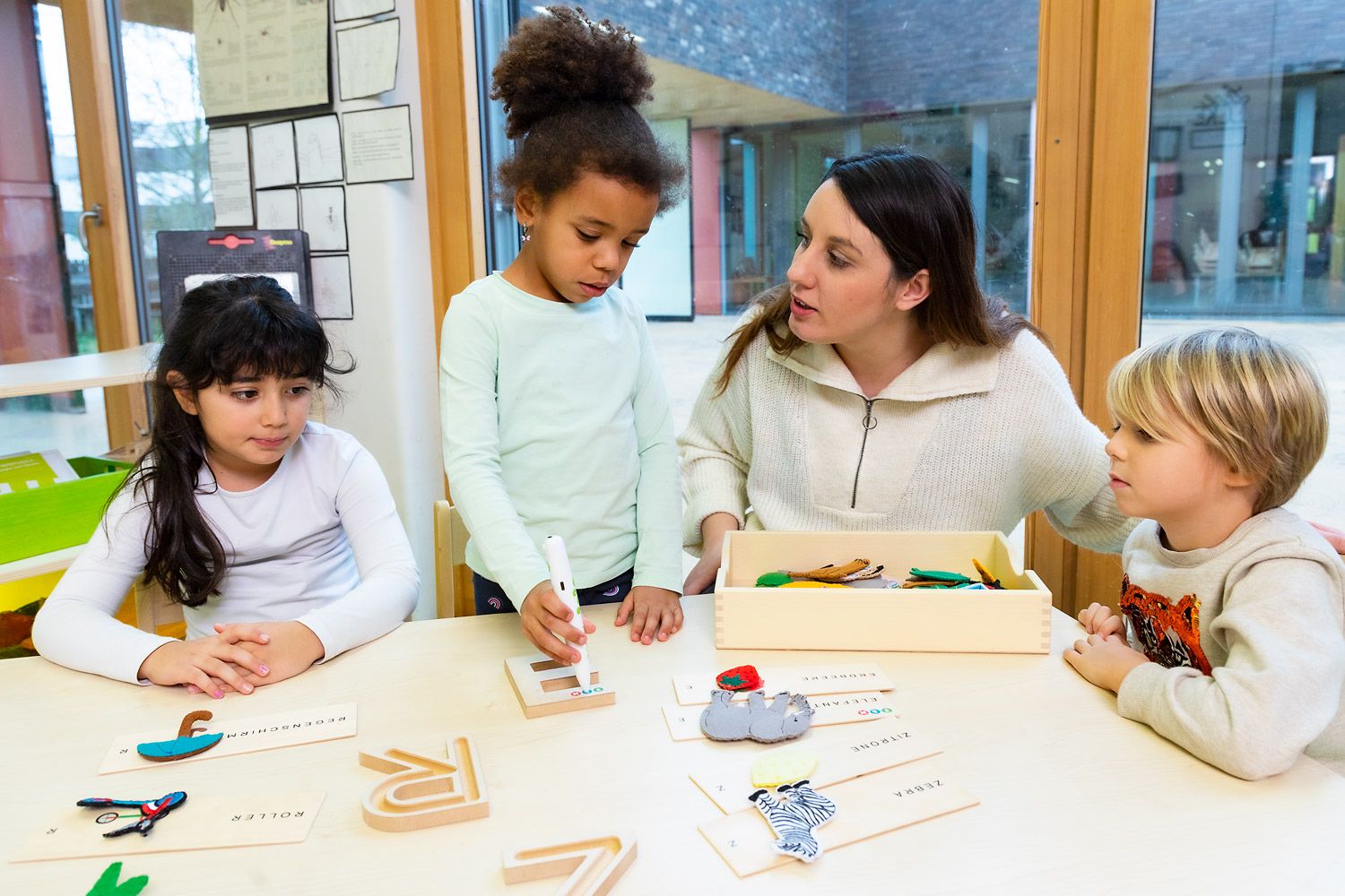 holistic language development activities focusing on phonology, concentration, and sensory perception.