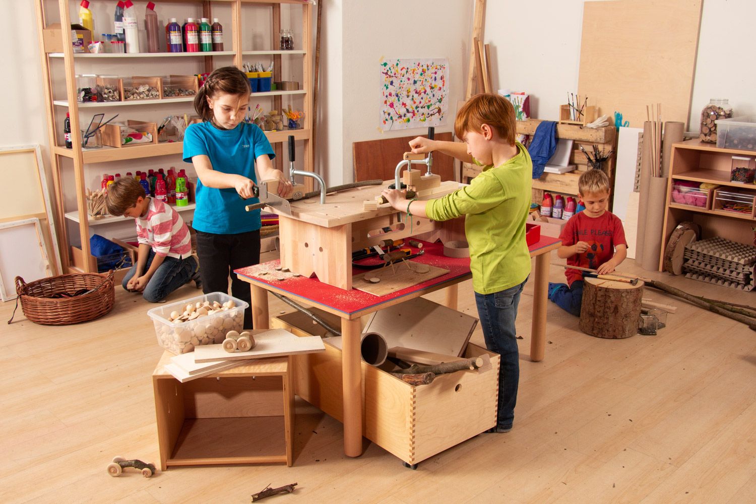 Tools and resources on a workshop table, encouraging hands-on STEAM activities and experimentation.